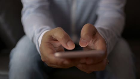 Close-up-woman-hands-texting-message-on-mobile-smart-phone-for-communication.