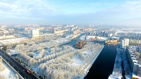 Aerial:-The-Cathedral-in-the-snow-capped-city-of-Kaliningrad,-Russia