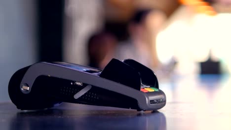 Wireless-payment.-Man-making-contactless-payment-with-smartphone.-4K.