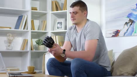 Man-Putting-on-Bionic-Prosthetic-Arm