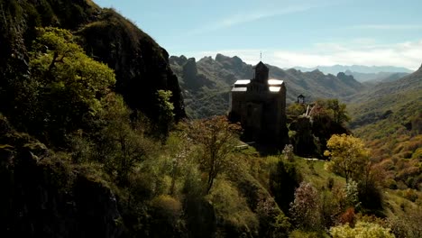 4K-UHD-Aerial-view-of-a-mountain-monastery-standing-on-a-cliff