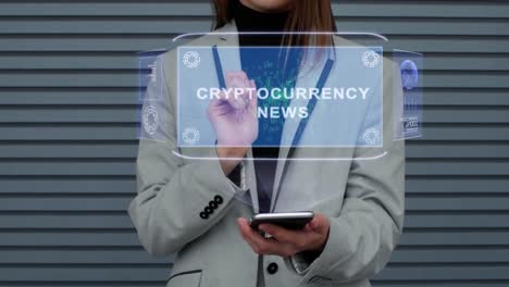 Geschäftsfrau-interagiert-HUD-Hologramm-Cryptocurrency-News