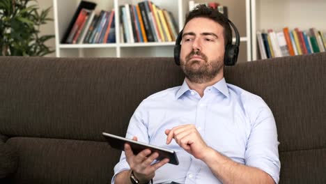 Video-about-man-listening-to-music-at-home