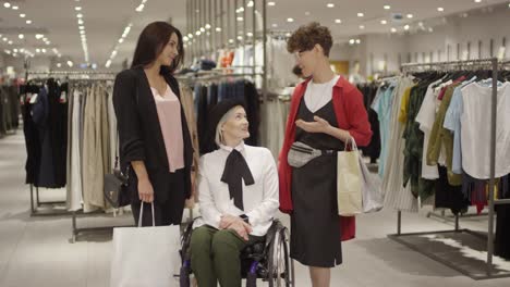 Happy-Female-Friends-Posing-in-Clothing-Store