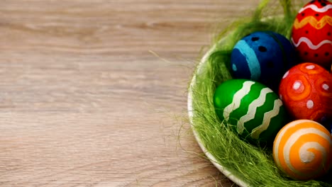 Easter-Eggs-in-a-Plate-on-a-Light-Wooden-Background