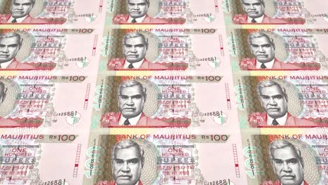 Banknotes-of-one-hundred-rupees-of-the-bank-of-the-Mauritius-Islands-rolling-on-screen,-coins-of-the-world,-cash-money,-loop