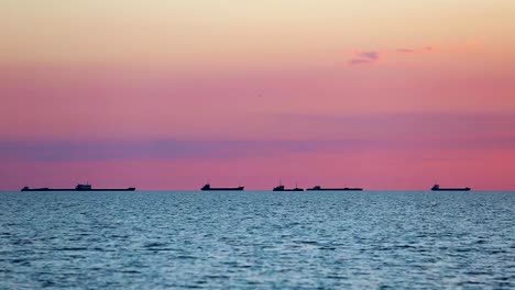 ships-in-the-sea-at-sunset