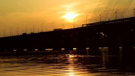 River-and-bridge.Most-at-sunset