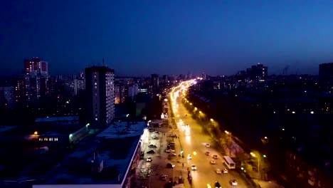 Vista-aérea-en-la-ciudad-de-noche-con-luces.-Vista-panorámica-de-la-ciudad-grande-bonita-en-la-noche