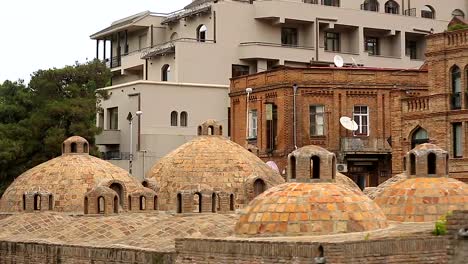 Abanotubani-sulfuric-baths-in-ancient-district-of-Tbilisi,-famous-tourist-place