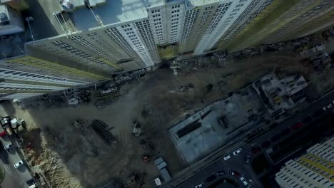 Aerial-view.-Urban-area-in-the-metropolis.-Construction-of-high-rise-residential-apartments-in-the-city.-View-of-the-building-site-from-above.-Sale-and-rental-of-residential-property