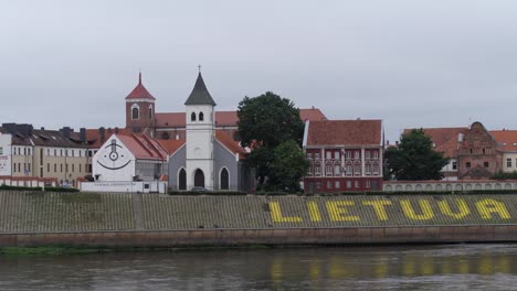 Lithuania.-Vilnius-city.-River-flows.-On-the-other-side-is-the-beautiful-university-building.-4K-Slow-Mo