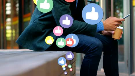 Man-sitting-on-a-brick-platform-checking-his-phone-4k