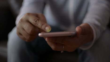 Close-up-woman-hands-using-mobile-smart-phone-for-social-online.