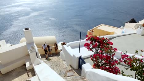 Sunlit-sea-viewed-from-top-of-mountain-with-bright-coastal-houses-and-terraces