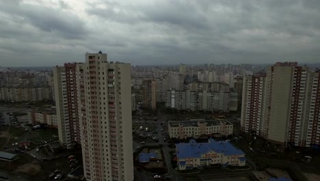 Aerial-drone-footage-of-gray-dystopian-urban-area-with-identical-houses