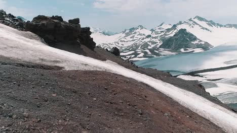 Aerial-shot-of-scenic-nature-snowy-rocky-peaks-landscape