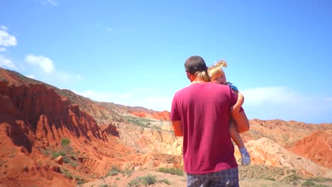 father-with-child-in-the-mountains