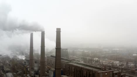 Kohle-Strom-Kraftwerk-Fabrik-zur-Herstellung-von-massiven-Smoke-Stack-Umweltverschmutzung-Dämpfe.