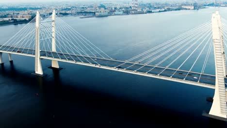 motion-along-modern-cable-stayed-bridge-against-cityscape