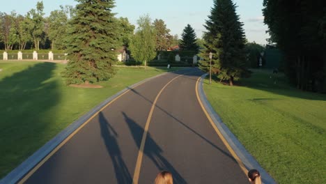 Aerial-shot-of-lgbt-couple-biking-on-bicycle-lane