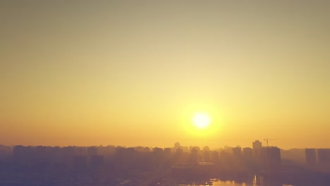 4k-Aerial-drone-shot-sunrise-over-the-metropolis-Beautiful-cityscape-early-in-the-morning