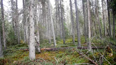 Man-hunter-outdoor-in-forest-hunting-alone