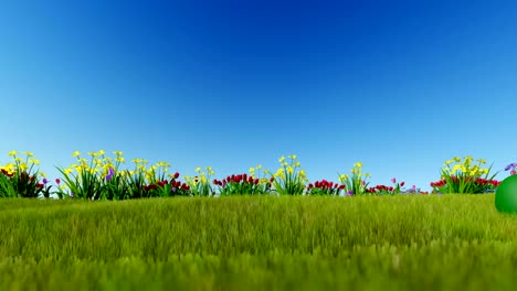 Easter-eggs-on-green-meadow-over-blue-sky,-panning