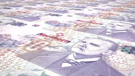 Banknotes-of-fifty-pounds-of-Northern-Ireland-rolling,-cash-money