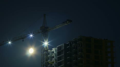 Multi-storey-House-and-a-Crane-at-Night