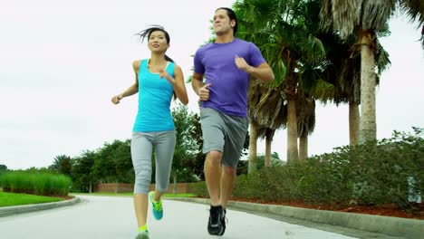 Happy-Ethnic-couple-enjoying-healthy-fitness-lifestyle-jogging