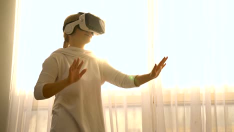 Beautiful-young-female-playing-game-in-vr-glasses