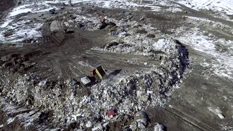 AERIAL:-Movie-of-a-truck-working-in-a-landfill