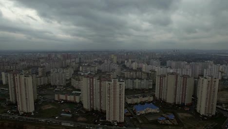 Aerial-drone-footage-of-gray-dystopian-urban-area-with-identical-houses