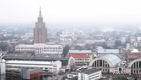 Riga,-Latvia.-Top-View-Cityscape-In-Misty-Fog-Rainy-Day.-Latvian-Academy-Of-Sciences,-Bus-Station-Riga-International-Coach-Terminal-And-Riga-Central-Market