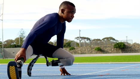 Disabled-athletic-exercising-on-a-running-track-4k