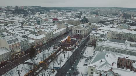 Lviv,-Ukraine.-Arial-shot.-Opera-house.-Christmas-tree.-Christmas-Fair.-People-are-walking-around-the-city-center.-Winter