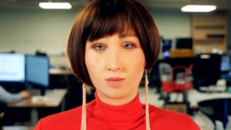 Close-up-of-female-mannequin's-face-while-winking-and-talking