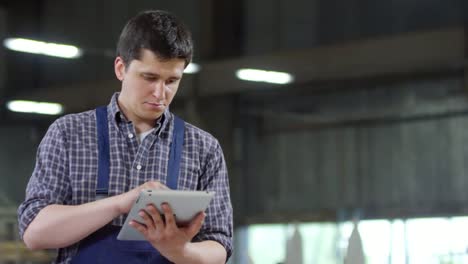 Worker-Using-Tablet