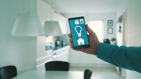 App-on-mobile-phone-controls-light-bulbs-in-smart-home