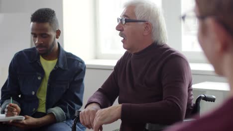 Disabled-Professor-Talking-to-Group-of-Students