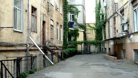 Cozy-narrow-courtyard-among-the-old-houses-in-the-city.