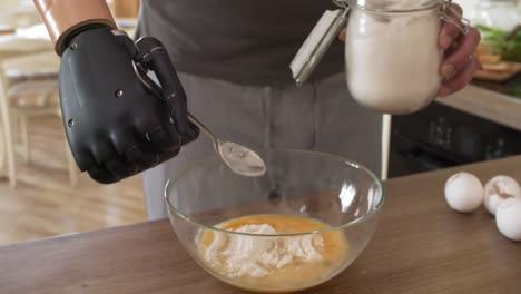 Man-with-Myoelectric-Prosthetic-Forearm-Cooking-at-Home