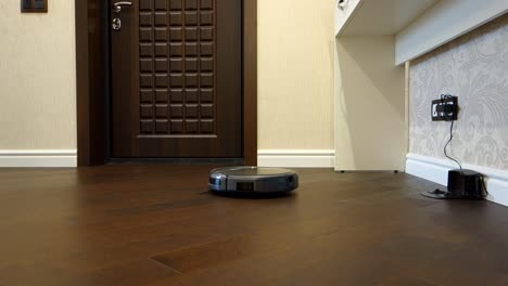 robotic-vacuum-cleaner-starts-and-leaves-the-charging-base