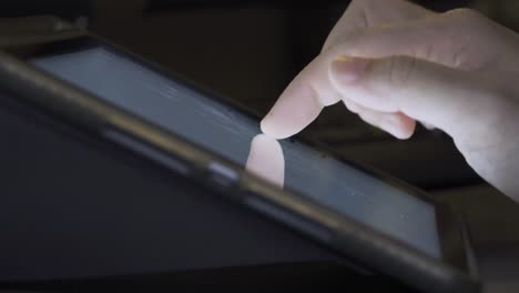 4K-Video-close-up-finger-touch-on-tablet-screen.