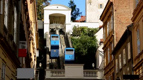 View-on-moving-cabins-of-Zagreb-funicular-from-Tomic-street,-transportation