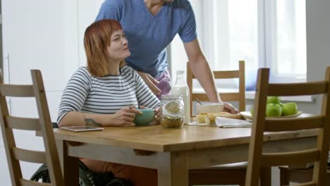 Paraplegic-Woman-and-her-Boyfriend-Eating-Breakfast