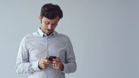 Young-man-using-mobile-phone