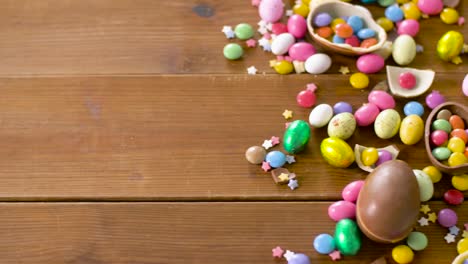 chocolate-easter-eggs-and-drop-candies-on-table