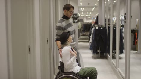 Paraplegic-Woman-Trying-on-Outfit-at-Store